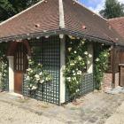 The pavilion at Roseraie du Val-de-Marne has ‘Ghislaine de Feligonde’ growing up the walls.