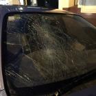 The driver’s window and windscreen of a car parked in lower Stuart St were smashed on Monday...