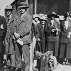 British ex-public school boys (left) and young Scotswomen, latest immigrants to New Zealand. —...