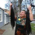 Arrowtown Preschool teacher Mercy Liu pictured after shaving off 93cm of her hair at Arrowtown’s...