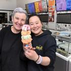 Former Rob Roy Dairy owner Liz Watson hands the baton (also known as an ice cream) to new owner...