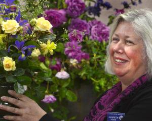 In November 2012, the Otago Rose Society’s then-president Maureen Viggo with a bunch of her ...