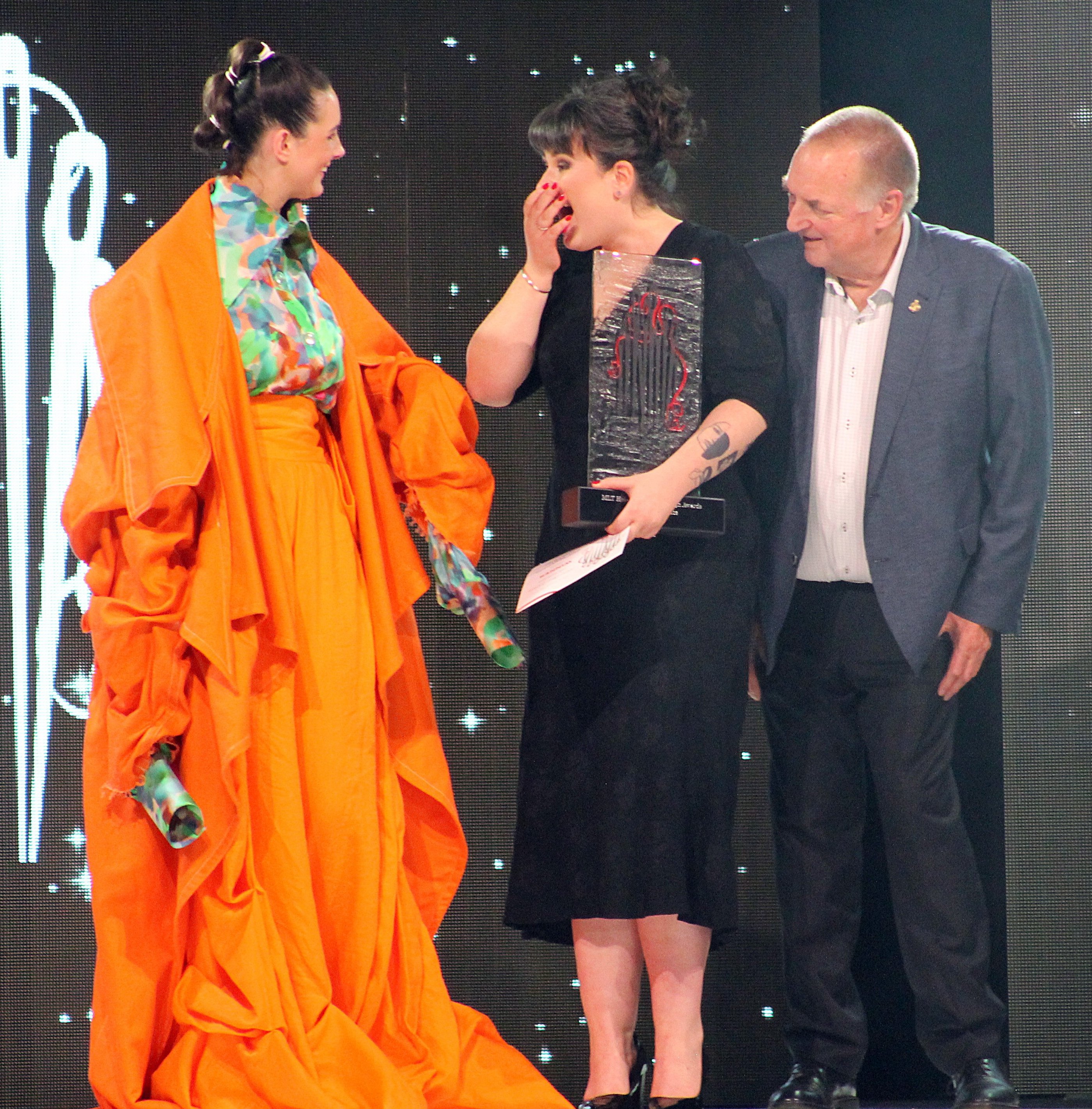 Tegan Rose Vickery (centre), of the Otago Polytechnic School of Fashion in Dunedin, received the...