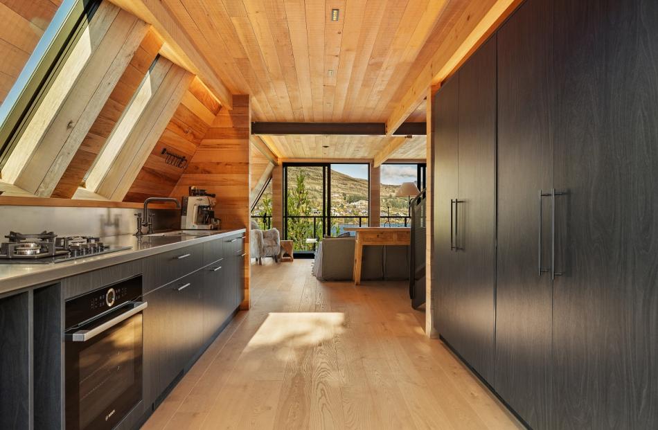 Skylights flood the kitchen with natural light.