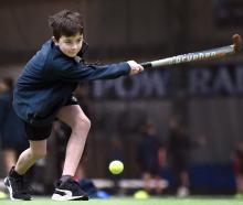 Elijah Henningsen, 12, swings a hockey stick. PHOTOS: PETER MCINTOSH