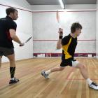 Canterbury’s Oliver Johnston (left) volleys against Wellington’s Oliver Dunbar during the final...