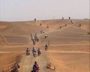 Bevan Smith gets under way at the start of his charity race from Morocco to the Atlantic Ocean across the Sahara Desert. Photos: Bevan Smith