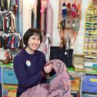 Stitch Kitchen manager Fiona Jenkin works on a Toni Darling jacket she found in an op-shop. PHOTO...