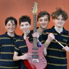 The Eight Balls band members (from left) bassist Daniel Cameron, 12, lead singer Alex Smith, 13,...