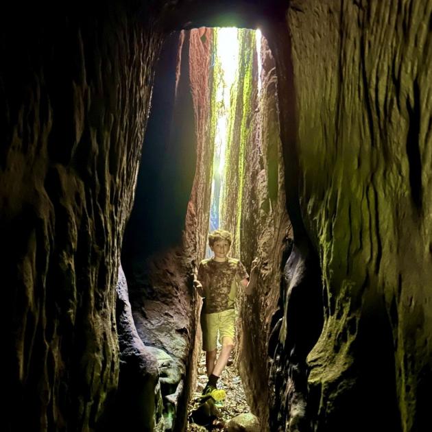 Tom North inside the Indiana Jones Cave at Te Aka. PHOTO: SUPPLIED