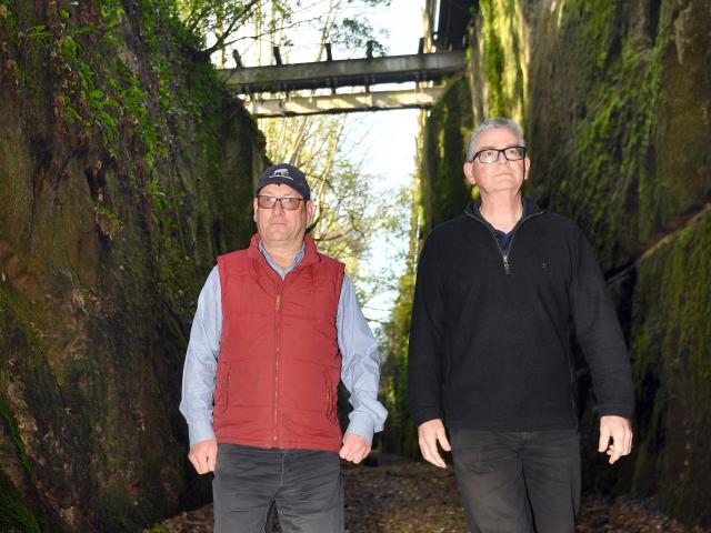 Dunedin Tunnels Trail Trust members Brent Irving (left) and Gerard Hyland are urging action be...