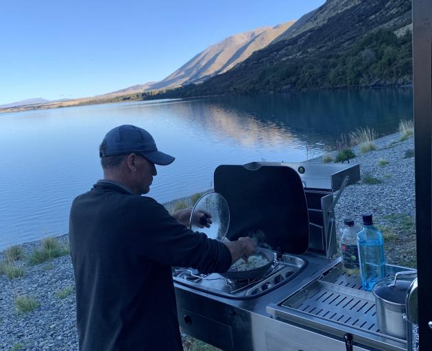 Cooking dinner outside in a remote and beautiful location.