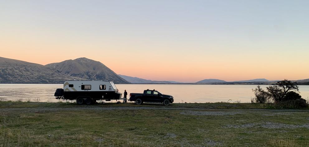 Living the dream. Absolute beachfront — Lake Ohau at dusk. PHOTOS: SUPPLIED