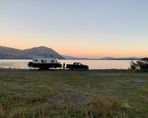 Living the dream. Absolute beachfront — Lake Ohau at dusk. PHOTOS: SUPPLIED