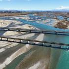 The Waitaki River flows towards the sea under blue skies yesterday. PHOTO: STEPHEN JAQUIERY